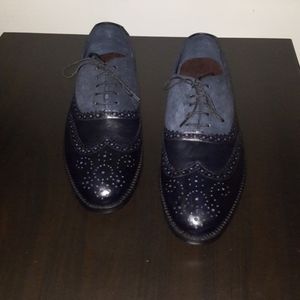 Wing tip oxford shoes